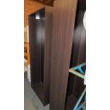 A pair of Ikea Pax wardrobe frames, black wood effect, lacking shelves, 202cm high, 75cm wide,