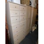 A six piece limed oak effect bedroom suite, possibly Alstons, including two door and three door