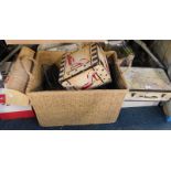 Assorted prints, CD rack, storage baskets, boxes and cases. (a quantity)
