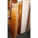 A pine three door wardrobe, flatpack, approx 188cm high, 130cm wide, 56cm deep when assembled.