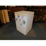 A Currys Essentials under counter fridge, model CUL55W10.