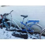 An Allux Giant aluminium bicycle, with a blue and silver frame.