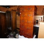 A walnut bow front china cabinet, together with a yew wood hi-fi cabinet, 121cm high, 66cm wide,
