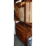 A mid 20thC walnut bow front china cabinet, with integral Smiths clock, 109cm high, 101cm wide, 24cm