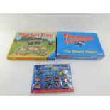 A Thunderbirds The Board Game, by Carlton., Ravensburger Market Day Game, and a Dufort limited