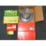 A pair of Brembo Vauxhall Astra brake discs, together with pads and an air oil filter, all boxed. (