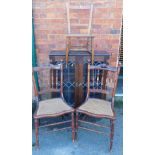 A dark oak veneered bookcase with two lead glazed doors, 98cm high, 84cm wide, 30cm deep, two