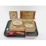 A mid century three piece brass and wool work floral dressing table set, boxed, matching bedroom