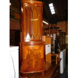 An octagonal coffee table, two small units, yew wood corner cabinet and a glass television stand. (