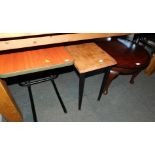 An oak tea trolley, workmate, mahogany coffee table and two additional tables. (5)