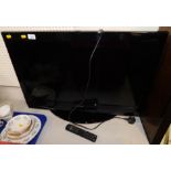 An Alba 32" colour television, model LCD 32880HDF, with remote.