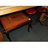 A square mahogany coffee table with leather inset, 43cm high, 61cm wide, 61cm deep, together with