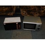 A Tower silver and marble effect microwave, model T24021WMRG, together with a Sharp microwave, model