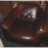 A brown leather armchair.