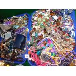 Costume jewellery, including necklaces and wristwatches. (2 trays)