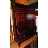A Stag Minstrel waterfall bookcase with single drawer to the base, 113cm high, 79cm wide, 31cm