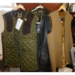 A Barbour wax Border jacket, medium size., olive shooting waistcoat, and an acrylic liner. (3)