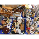 A pottery cart horse and cart, plaster figure of a fox, pottery and porcelain figures of horses,