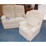 A fabric two seater sofa and matching armchair, upholstered in Lucia Camel beige coloured fabric,