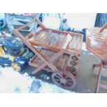 A teak garden drinks trolley.