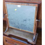 A 19thC mahogany swing frame toilet mirror, with outswept supports and galleried base, 55cm high,