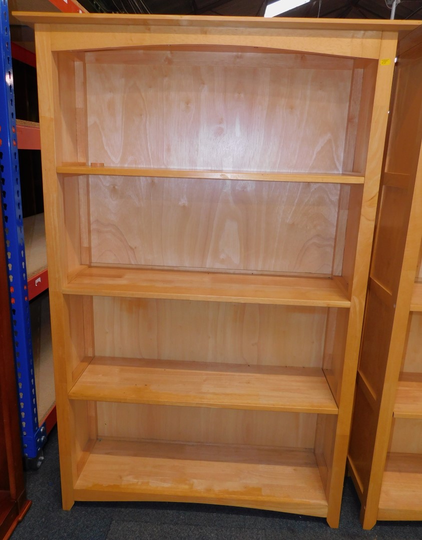 A beech bookcase, enclosing three shelves, 151cm high, 101cm wide, 34cm deep.