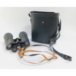 A pair of Optiges binoculars, 20 x 60 super, 524m auf 1000m, nr.23004, cased.