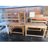 Six various workshop benches, of varying shapes and sizes, one with an attached vice.