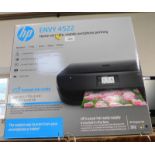 An HP Envy 4522 all-in-one printer, serial no TH6293K05W, boxed.