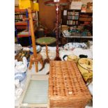 A wooden washing posser or dolly, scrubbing board, wicker picnic hamper, mahogany wine table and a