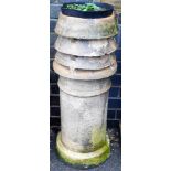 A Victorian stoneware chimney pot, the top with four sectioned cowel on a circular foot, 92cm