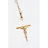 *A 9ct gold crucifix pendant and chain, the chain AF, 0.9g all in.