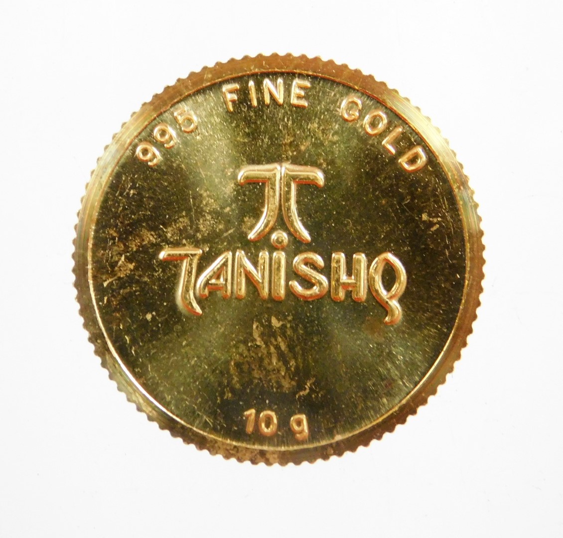 A Tanishq gold coin, depicting two Hindu figures, stamped 995 fine gold, 10g, in presentation sleeve - Image 2 of 3