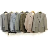 A group of gentleman's tweed and other suits, to include a grey set with jacket, waistcoat and
