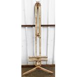 An artist's easel, used by Terry Shelbourne, evidence of woodworm, 185cm high, approx 55cm wide.