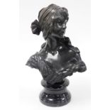 After Rubin. Bronze bust of a female, with scarf headdress on a black marble base, unmarked, 38cm