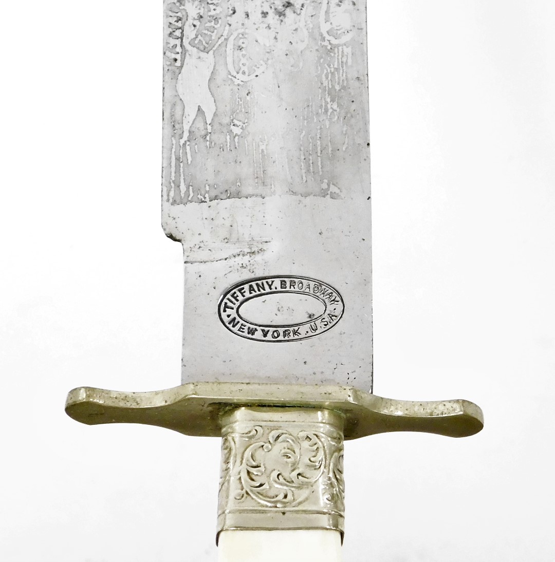 A Tiffany Broadway American knife, with a bone handle and silver plated scroll design ends, the - Image 3 of 4