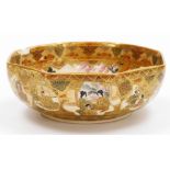 A Japanese Satsuma Earthenware hexagonal bowl, decorated in colours and heavy gilt with shaped