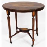 An Edwardian parquetry and mahogany Sheraton revival inlaid sofa table, the oval top with large