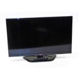 An 31 inch LG colour television, with power lead and remote.