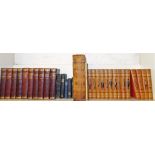A group of leather bound and other books, to include a Dickens series, various, leather bound Holy