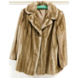 An Astraka of London half length fur coat