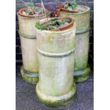 Three stoneware chimney or piping sleeves, 63cm high. (3)