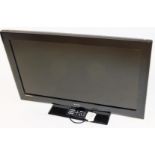 A Technika 31 inch flat screen television, with cable and remote.