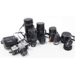 A group of camera lenses and cameras, to include a Miranda 1-3.5 lens, a Minolta 1-2 lens, a Vivitar