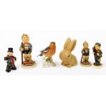 A group of ornaments, to include a Sylvac rabbit, Goebel bird and figures of children. (6)