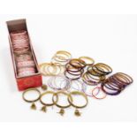 Various dress bangles, of varying design and colour, to include pink examples, clear beaded
