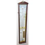 A mahogany cased Admiral Fitzroy barometer, with paper coloured backing, 101cm high.