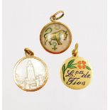 Three circular pendants, to include a gold framed bull pendant, a gold and enamel floral pendant and