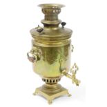 A 20thC Russian brass samovar, bearing various stamps and the wording Bafawebb, with shouldered body